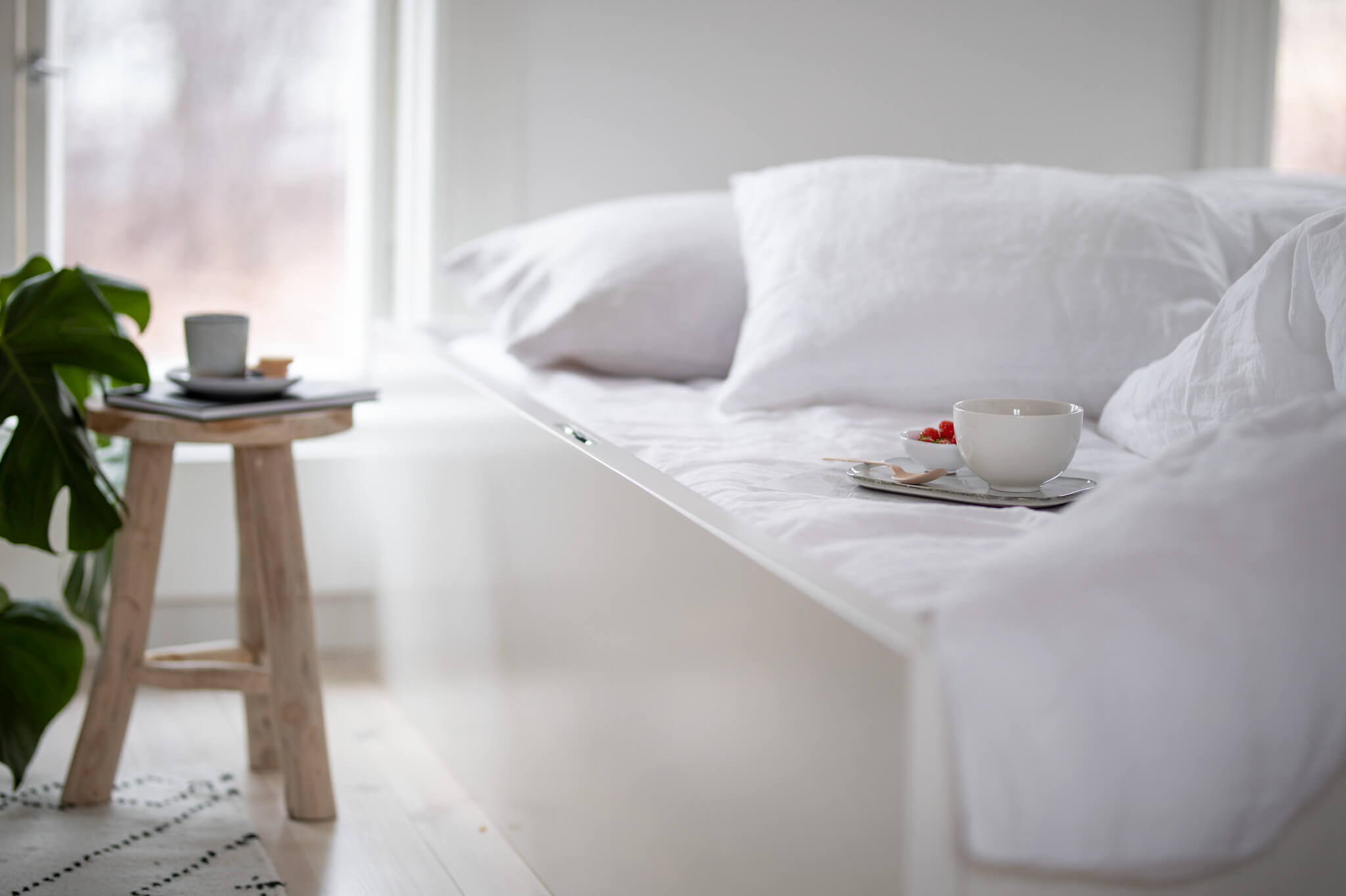 Tablebed in a small bedroom